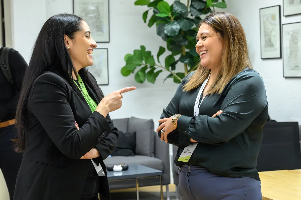 Team members chatting in the office
