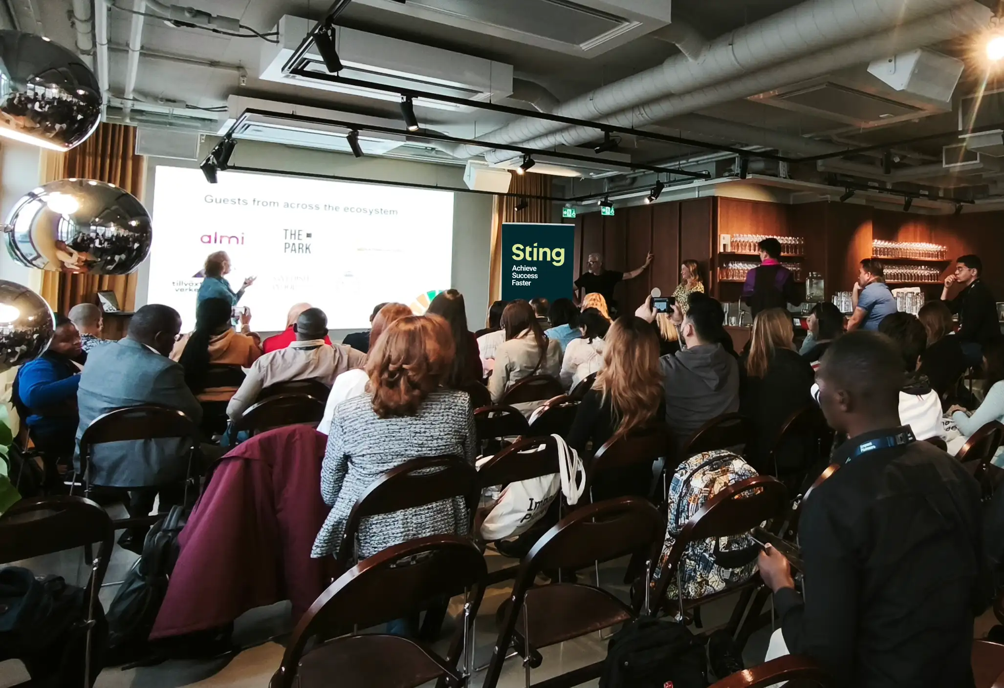 A presentations is held in front of an audience
