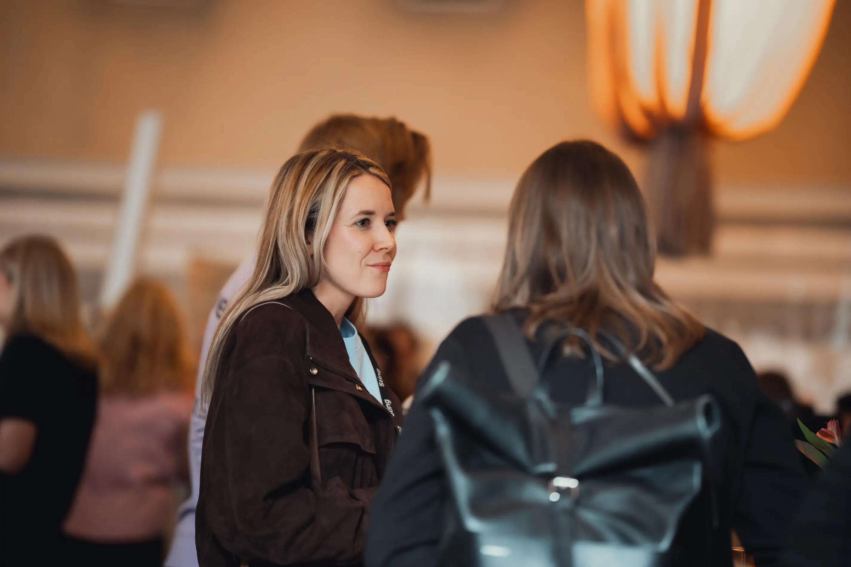 Two women mingling at Sting Demo Day 2026