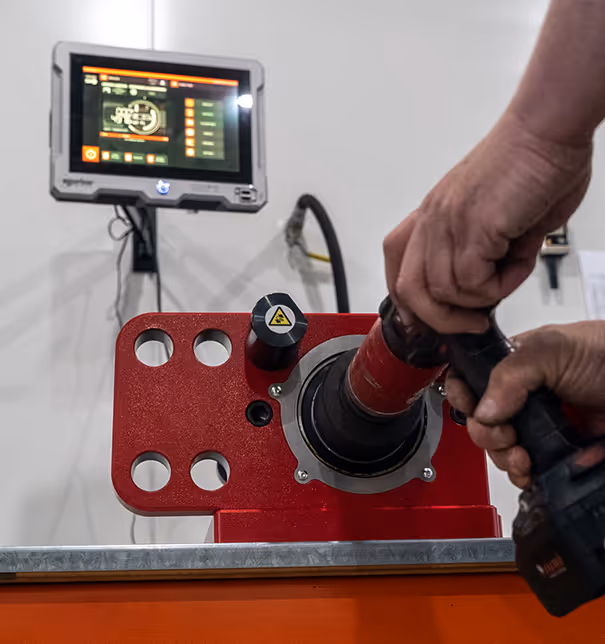 Professional torque wrench calibration testing equipment with digital display and precision measurement setup at Calitool facility
