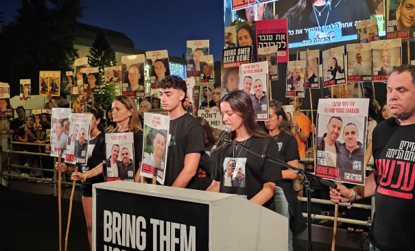 Hostages that were rescued from captivity speak at the main rally