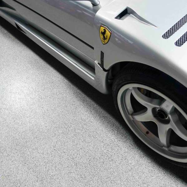 Lifetime coatings expert applying paint to a wall