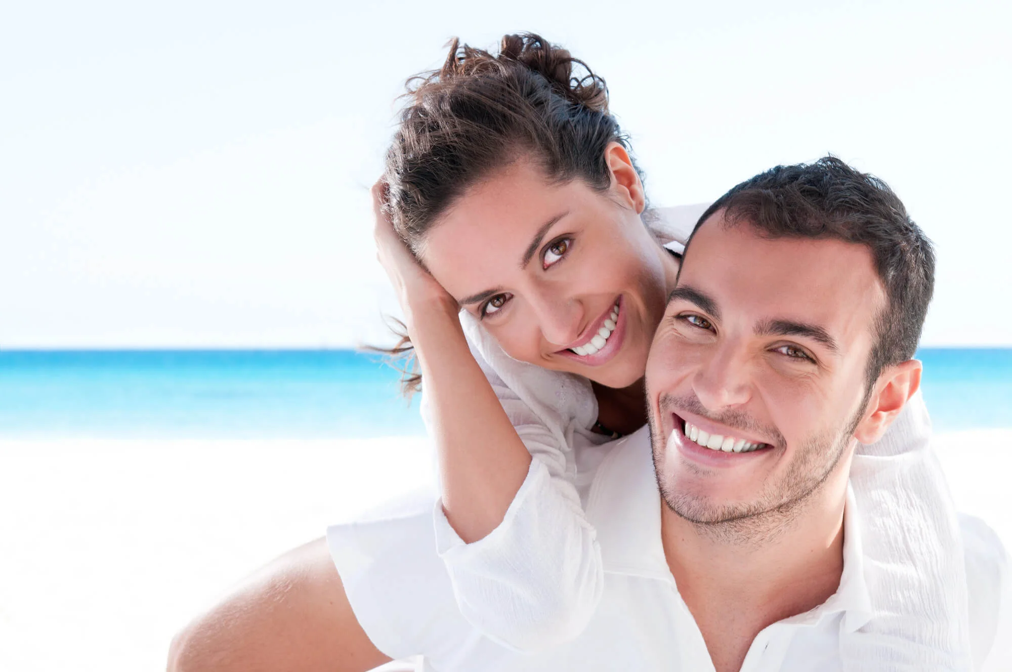 Smiling patient after teeth whitening in Houston