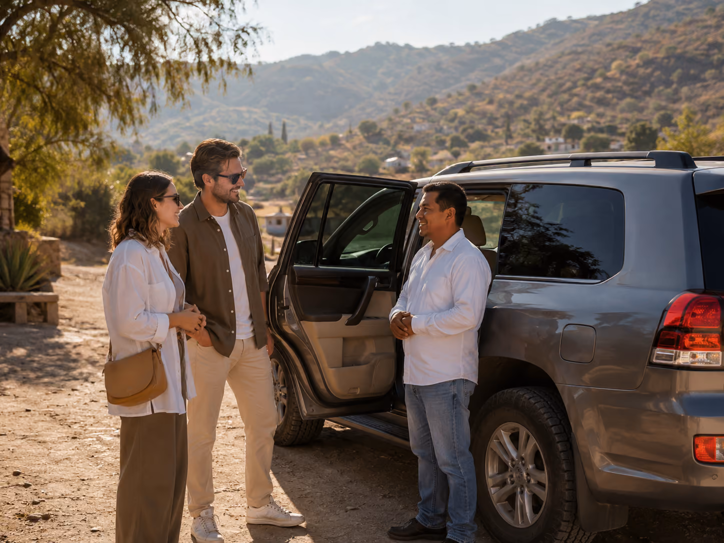 How Oaxaca Private Tours Work in 2026 – Private driver and guide with travelers in Oaxaca.