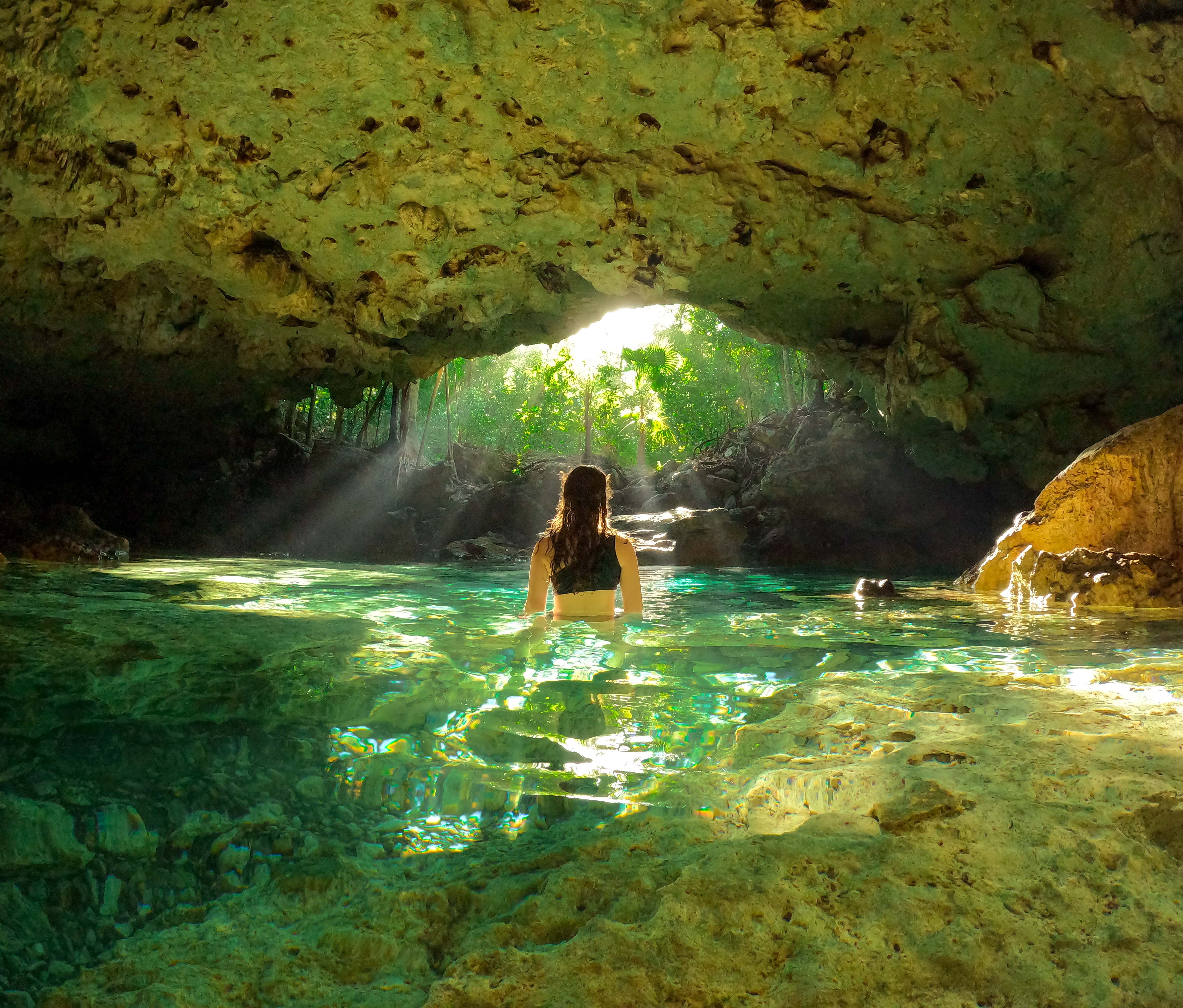 Best Cenote Tours in Yucatán for 2026 – Swimming inside a cave cenote in Yucatán.