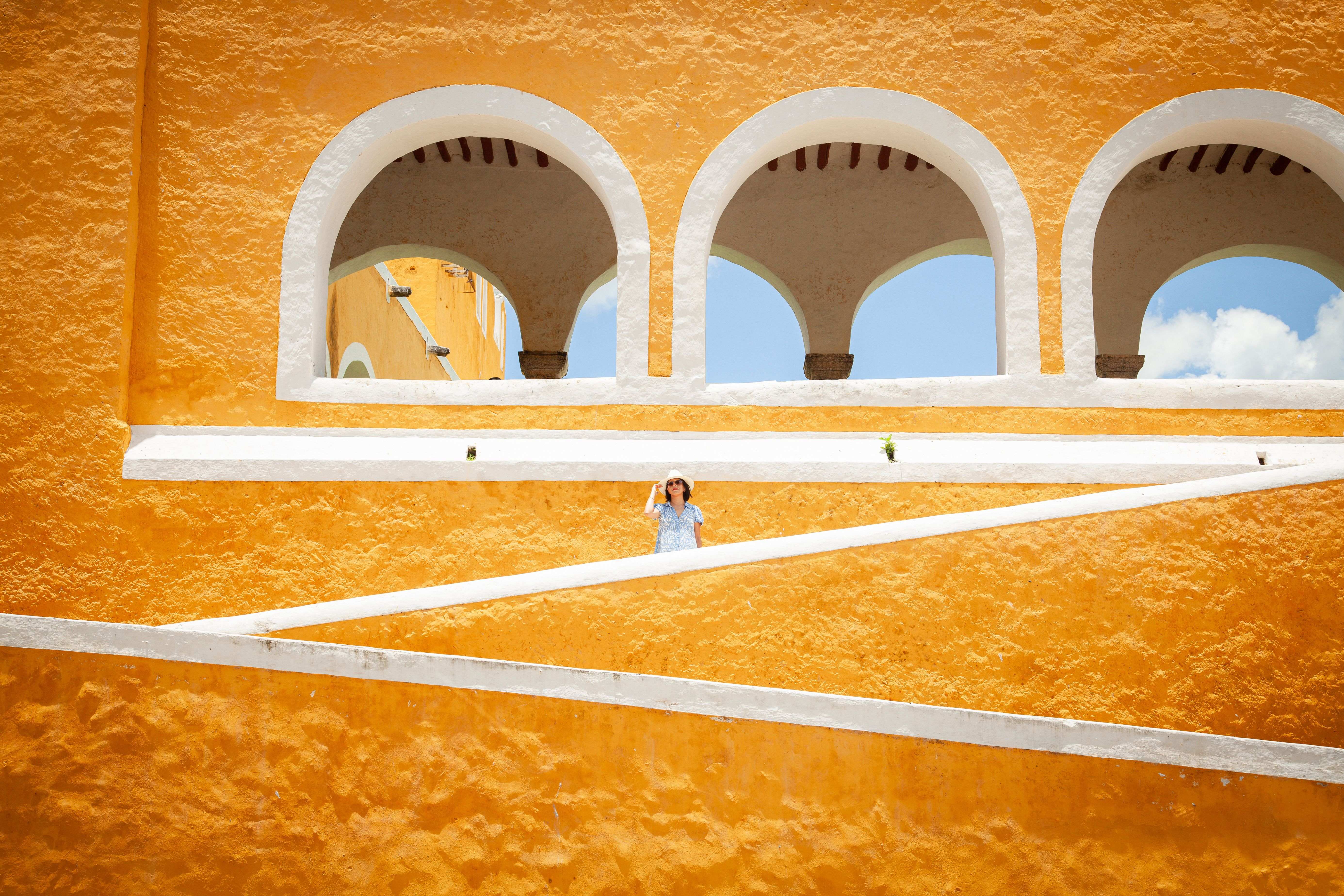A 2026 Guide to the Best Yucatán Tours – Yellow arches in Izamal, Yucatán.
