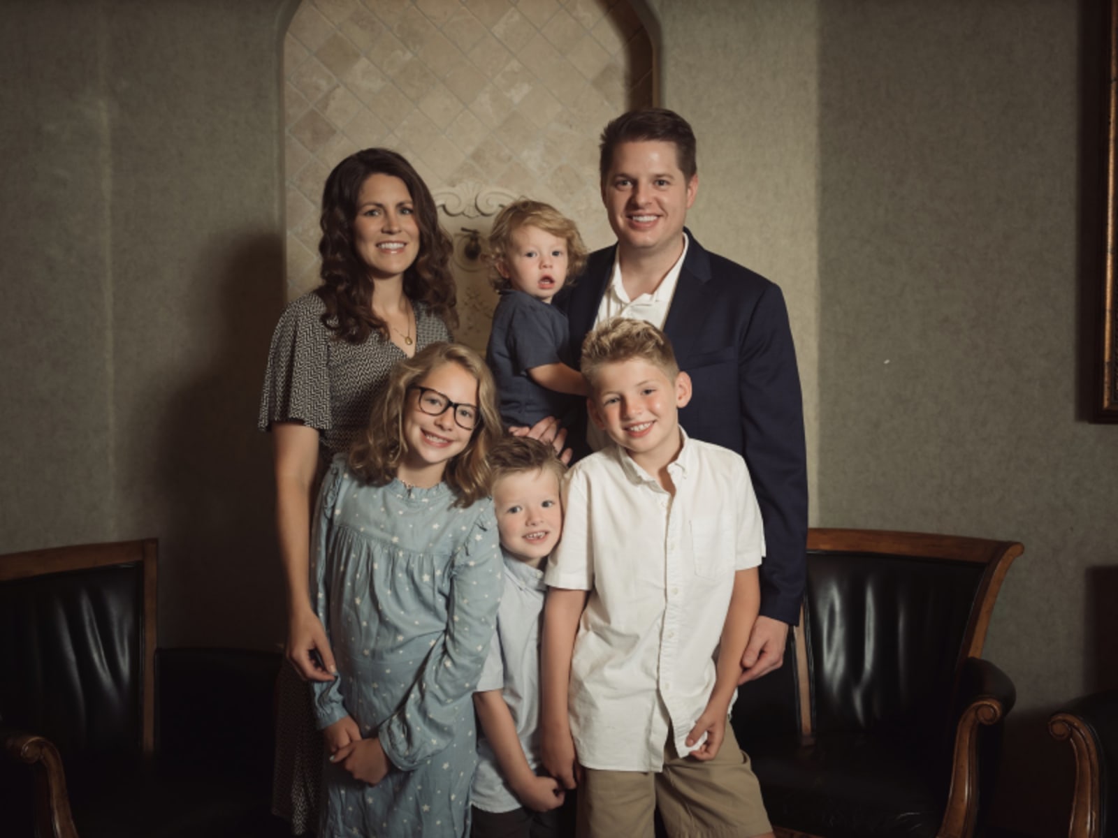 Titensor Dental team with family, showcasing friendly and welcoming practice culture