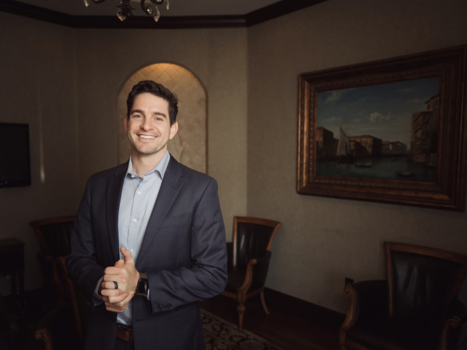 Male dentist in professional portrait at Titensor Dental office