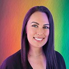 a woman with long hair smiling