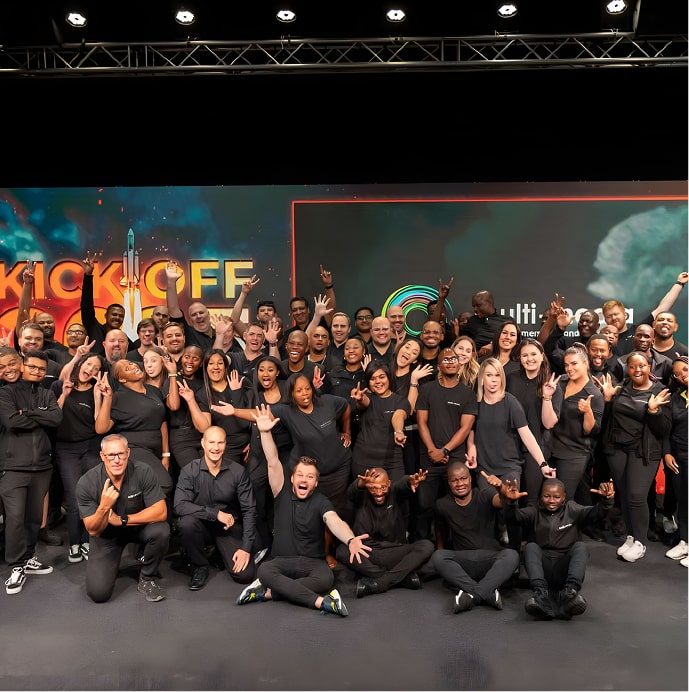 a group of people posing for a photo