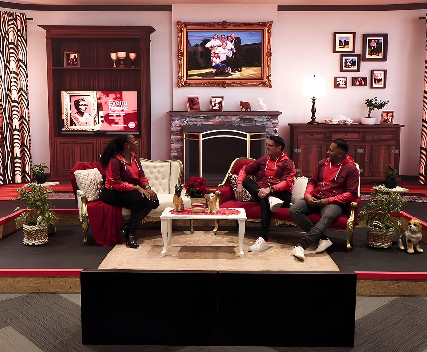 a group of people sitting on a stage