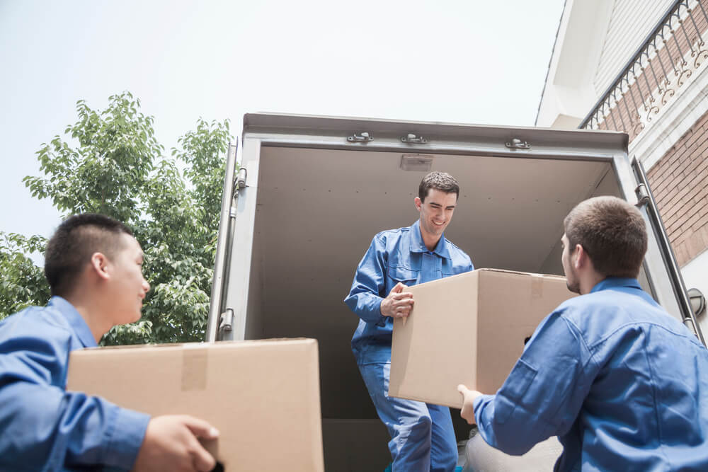Movers in Auburn AL loading boxes
