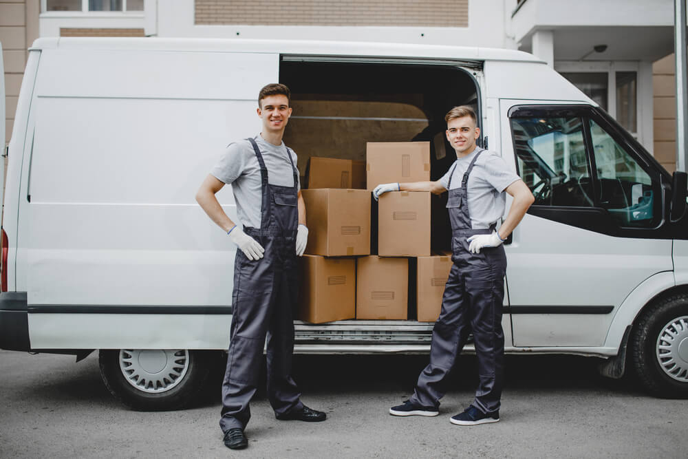 Movers in Nashville TN with some boxes loaded in a van