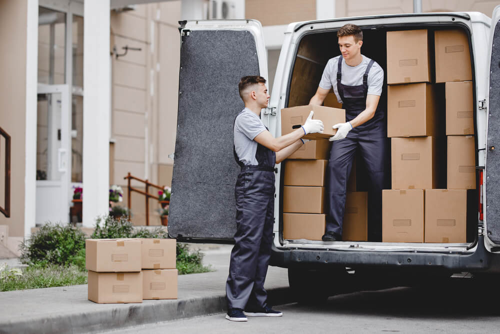 Movers Birmingham in Alabama loading some boxes in a van