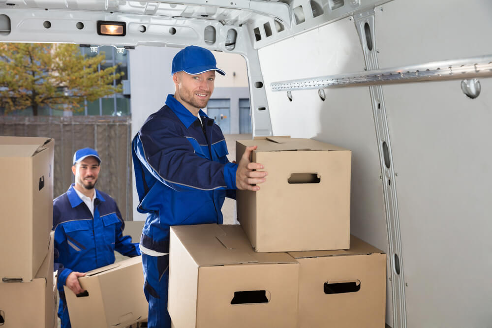 Moving Companies in Oklahoma City loading boxes.