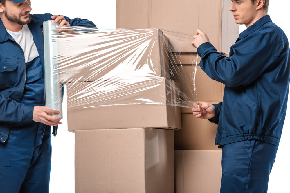 Athens Moving Experts wrapping boxes.