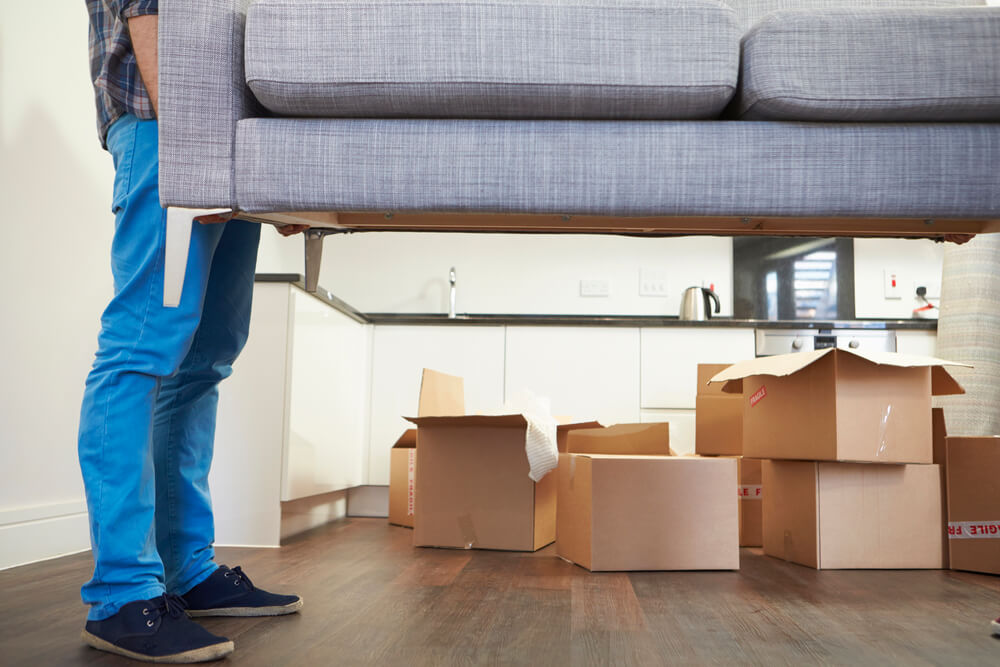 Lifting a sofa with the Best Moving Companies in Nashville.