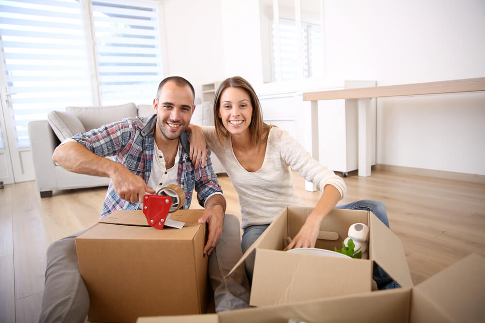 A happy couple ready to move with movers in Oklahoma City