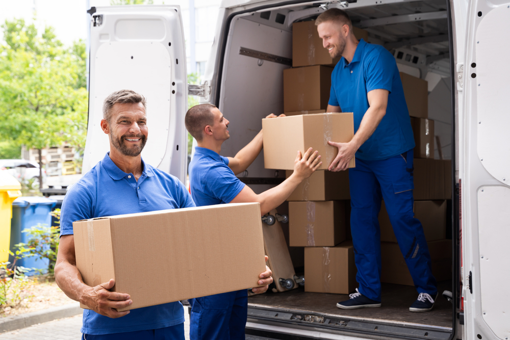 Truck-Movers-Loading-Van-Carrying-Boxes-And-Moving-House