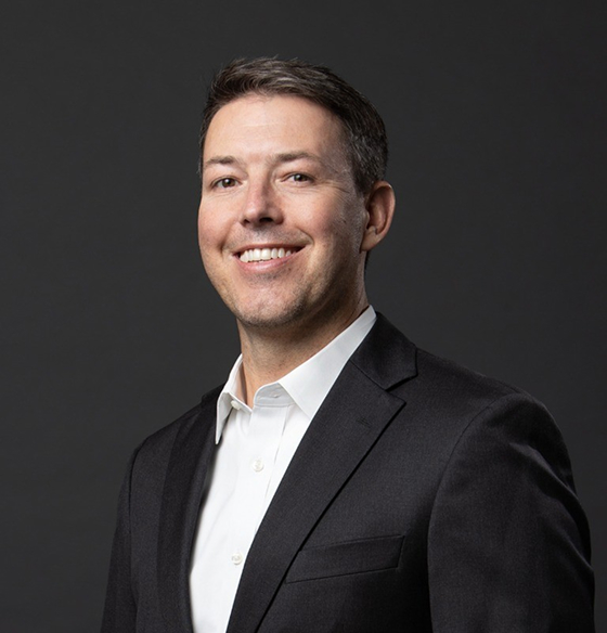 A headshot of Alex Wells, President and Lead Strategist at Strong in Dallas, Texas