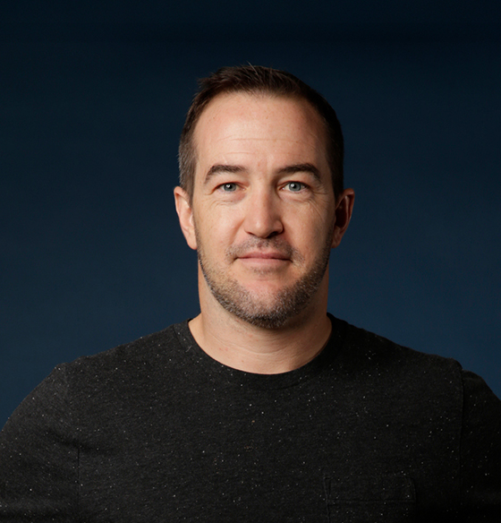 A headshot of Justin McGuffin, Creative Director at Strong in Dallas, Texas