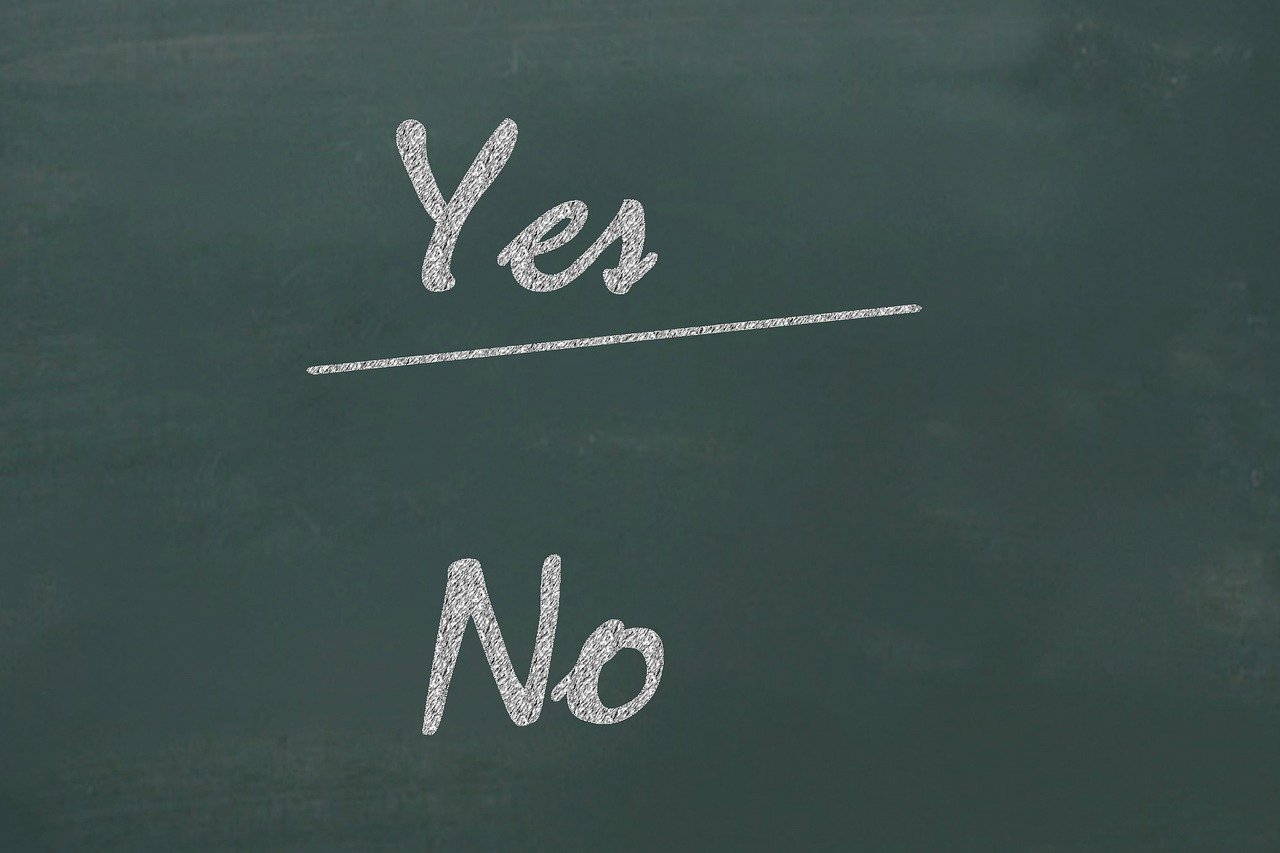 A sign that reads "Yes / No"