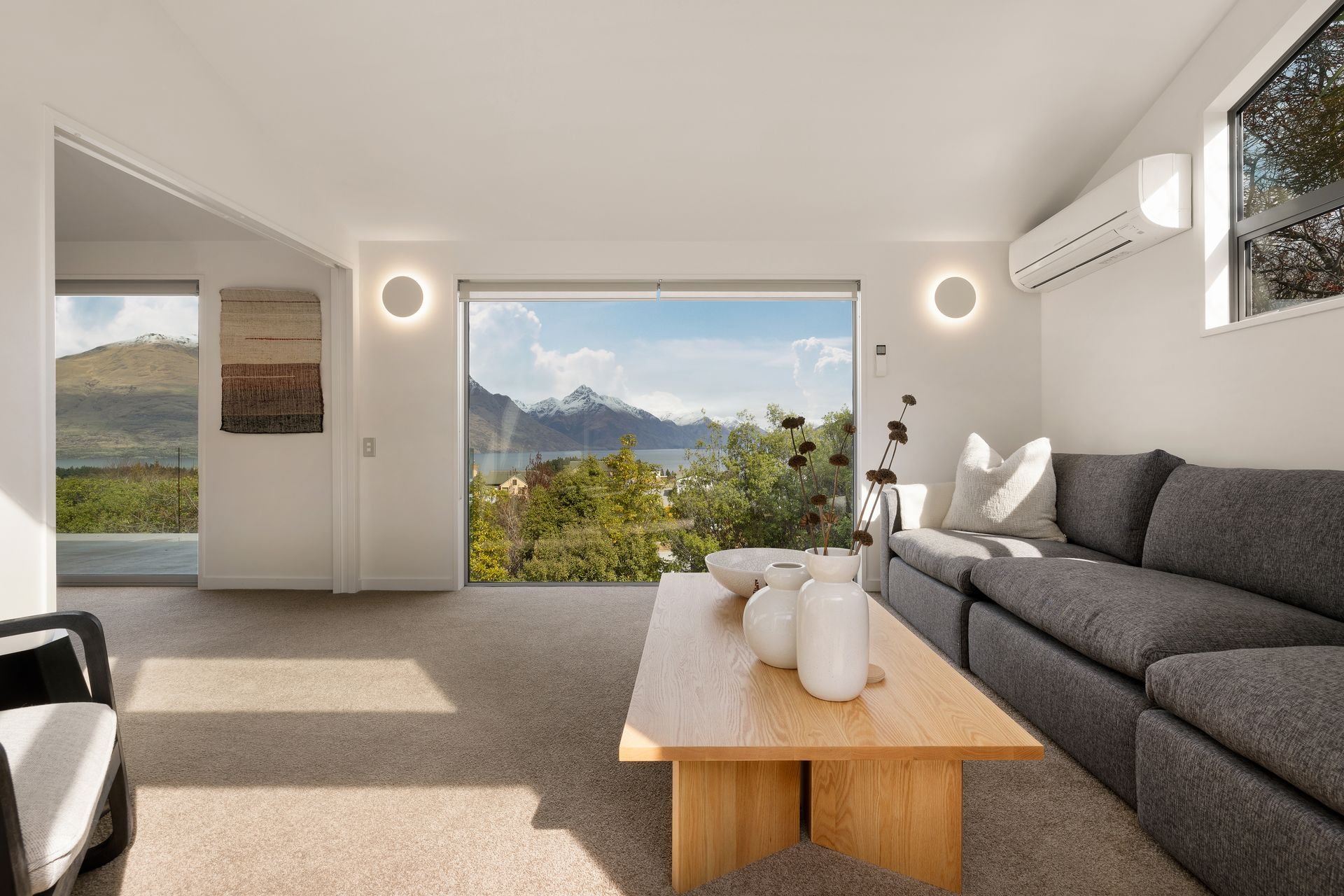 Second living room with lake and mountain views at Hillside Haven Queenstown