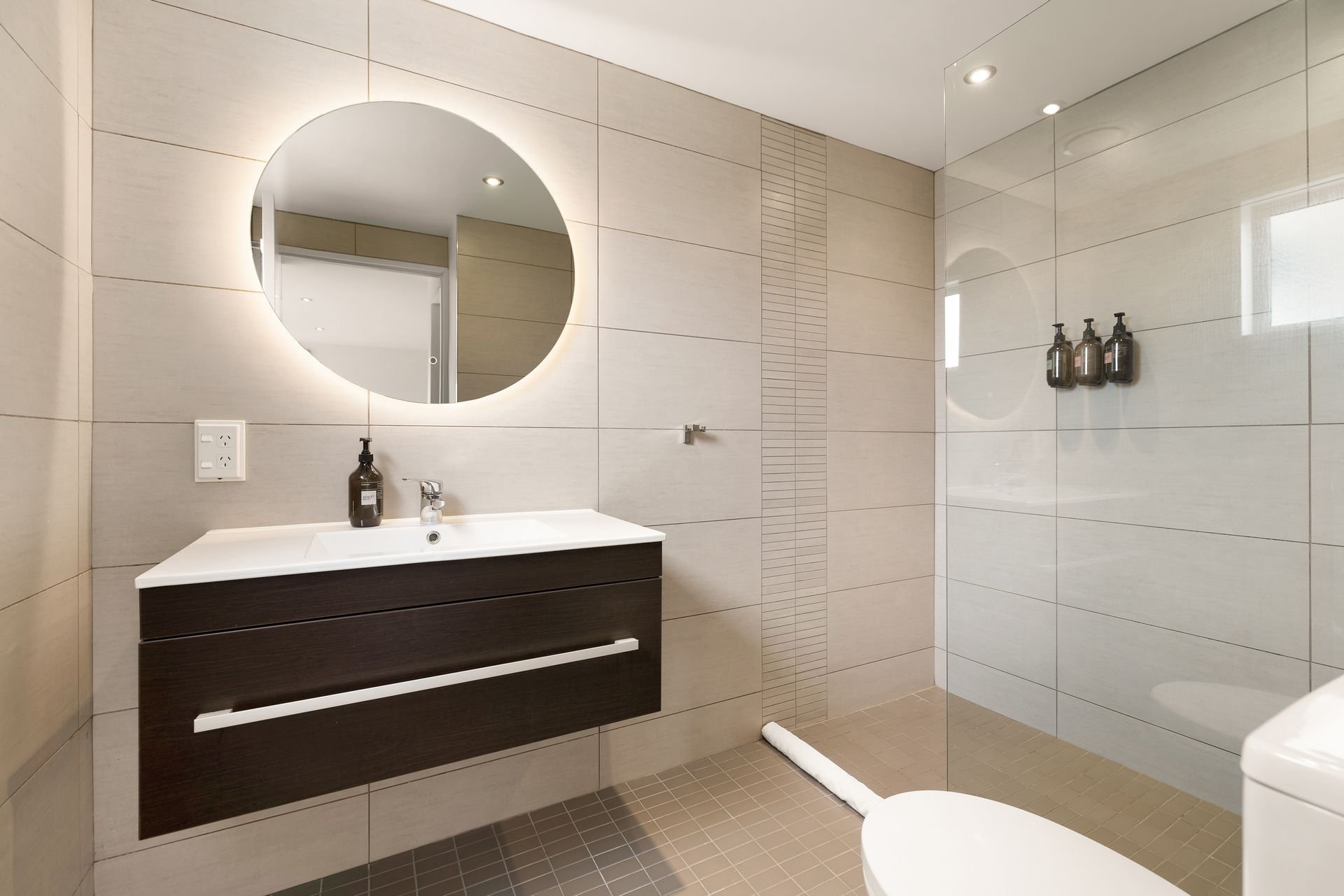 Ensuite bathroom with walk-in shower at Hillside Haven Queenstown