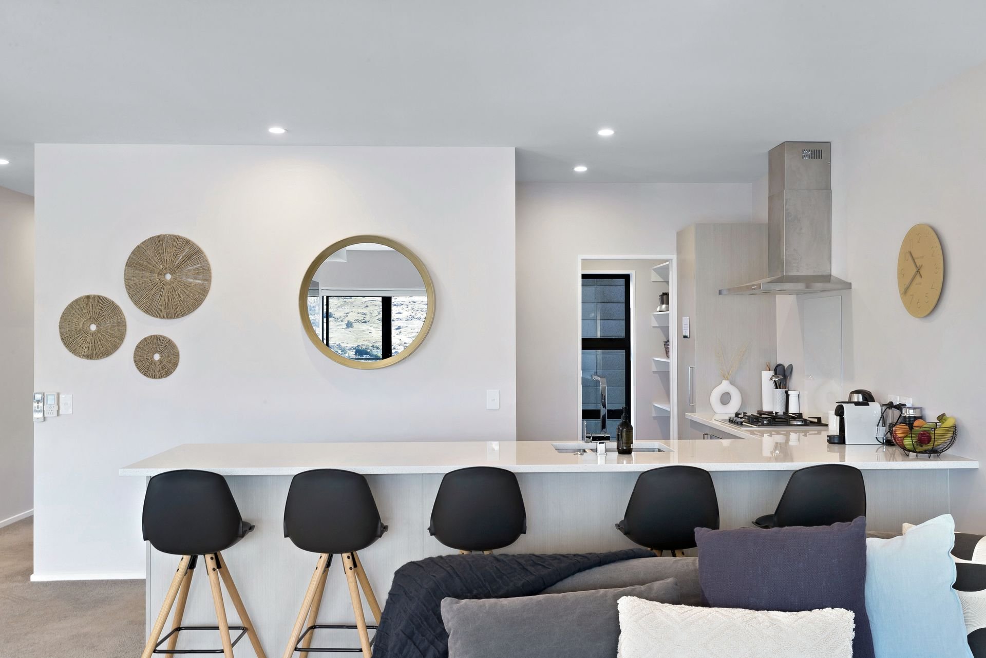 Kitchen breakfast bar with stools at Cecil Peak House, Queenstown