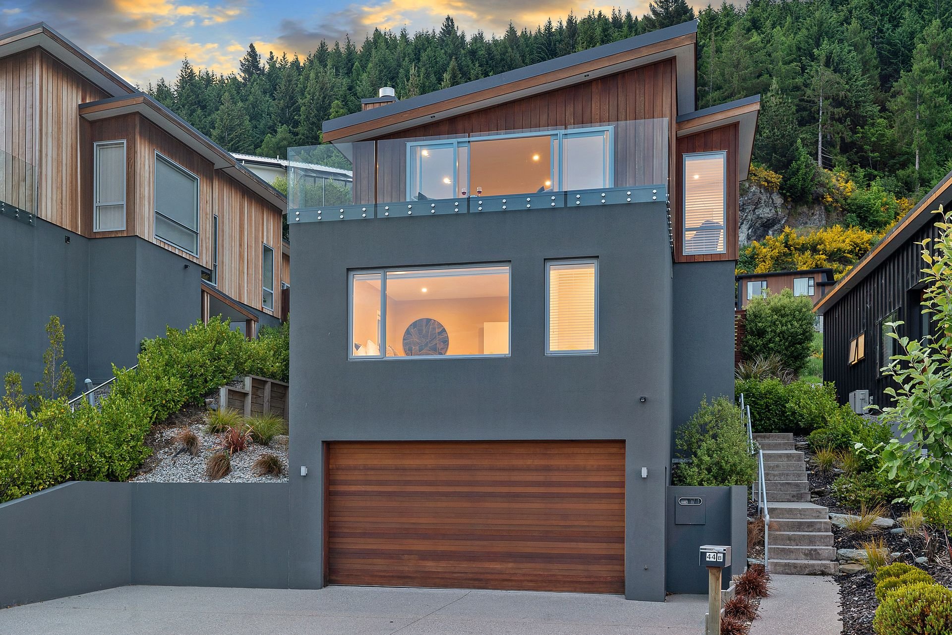 Exterior with garage for mountain bike storage at Highview Haven, Queenstown