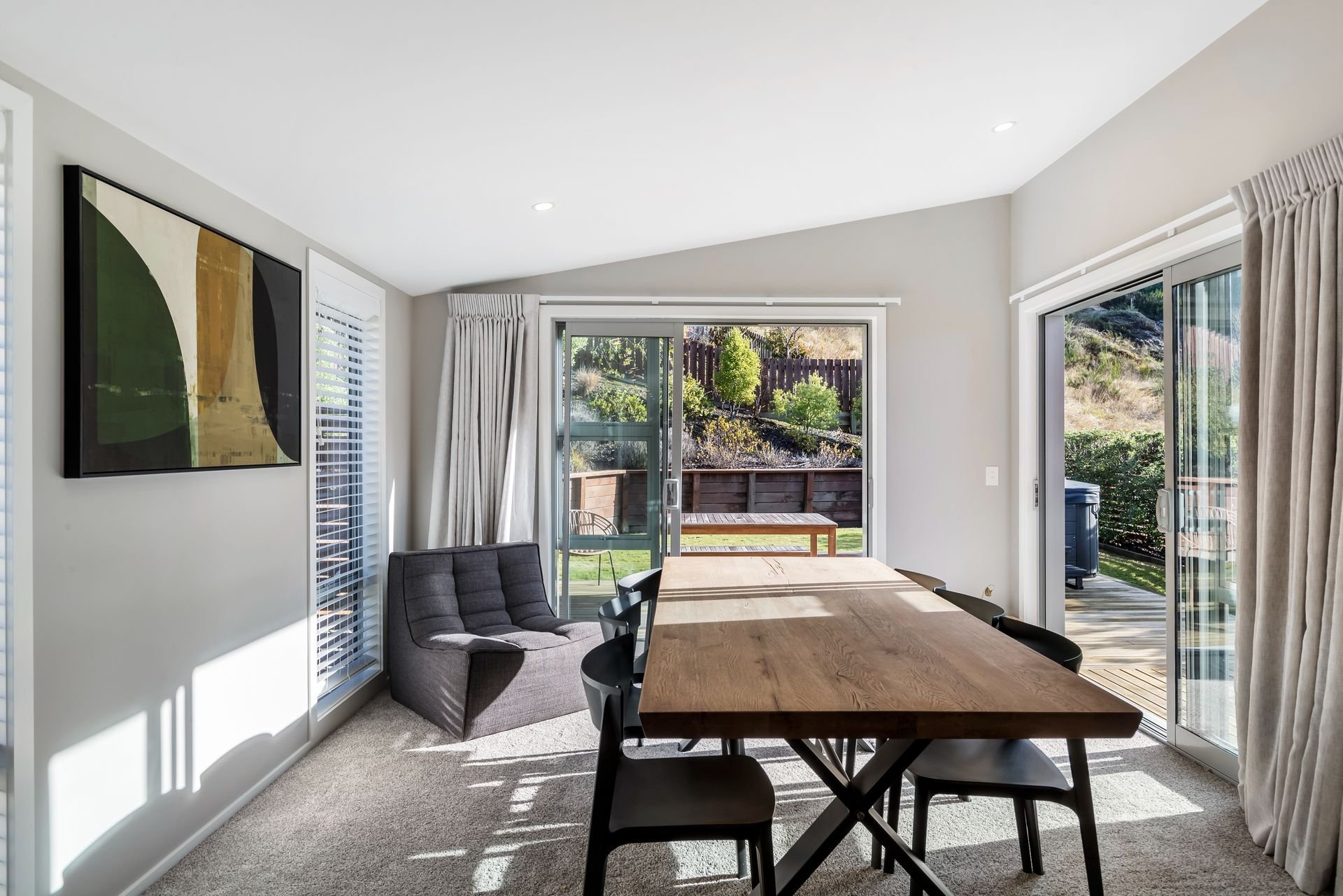 Dining table with garden outlook at Highview Haven, Queenstown