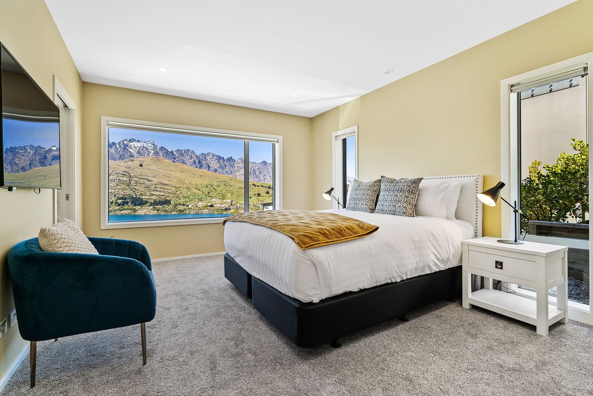 Master bedroom with lake views at Highview Haven, Queenstown