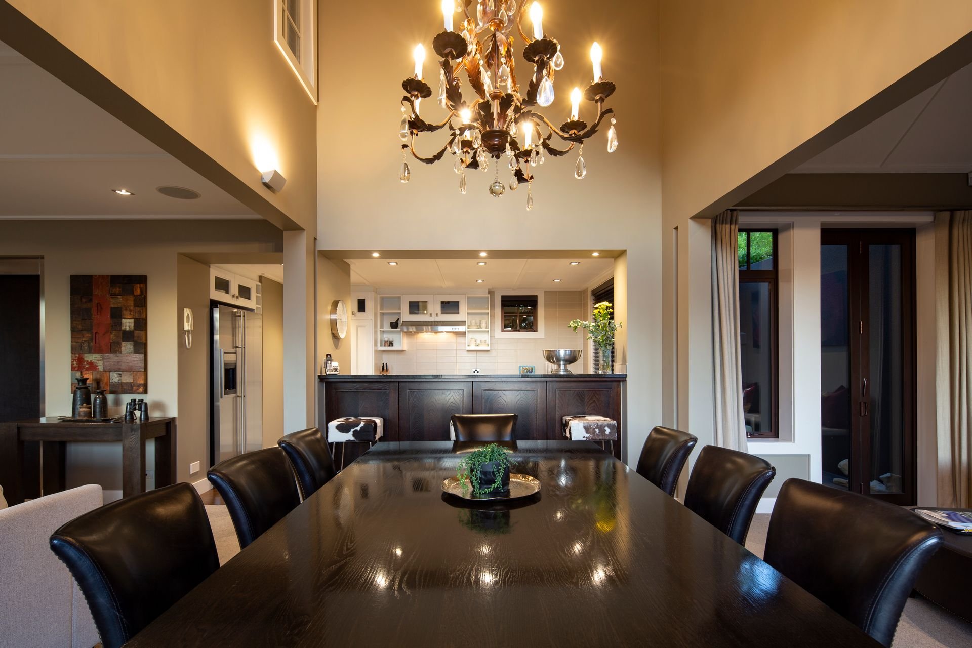 Dining table with chandelier at Karamata, Queenstown