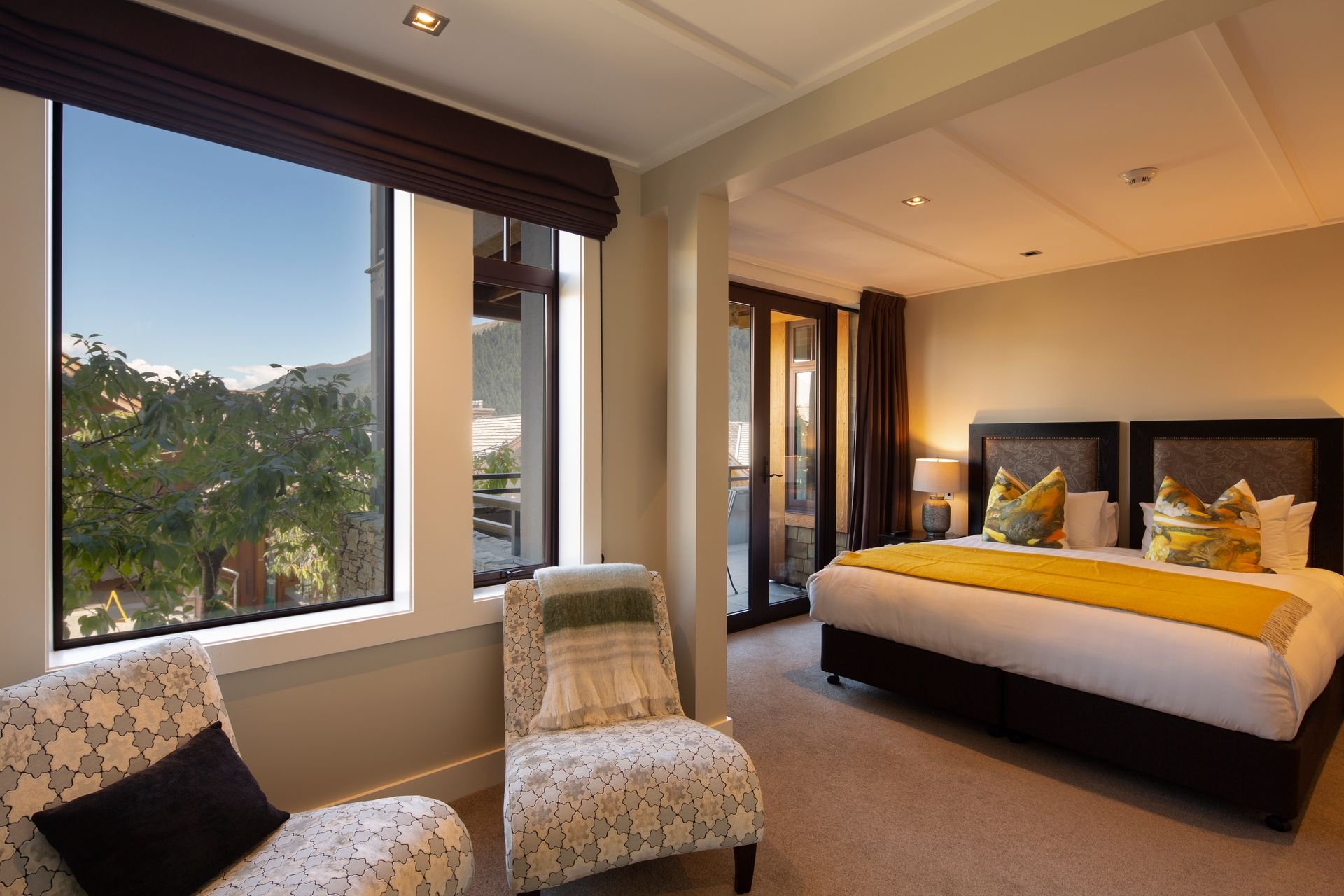 King bedroom with views at Karamata, Queenstown