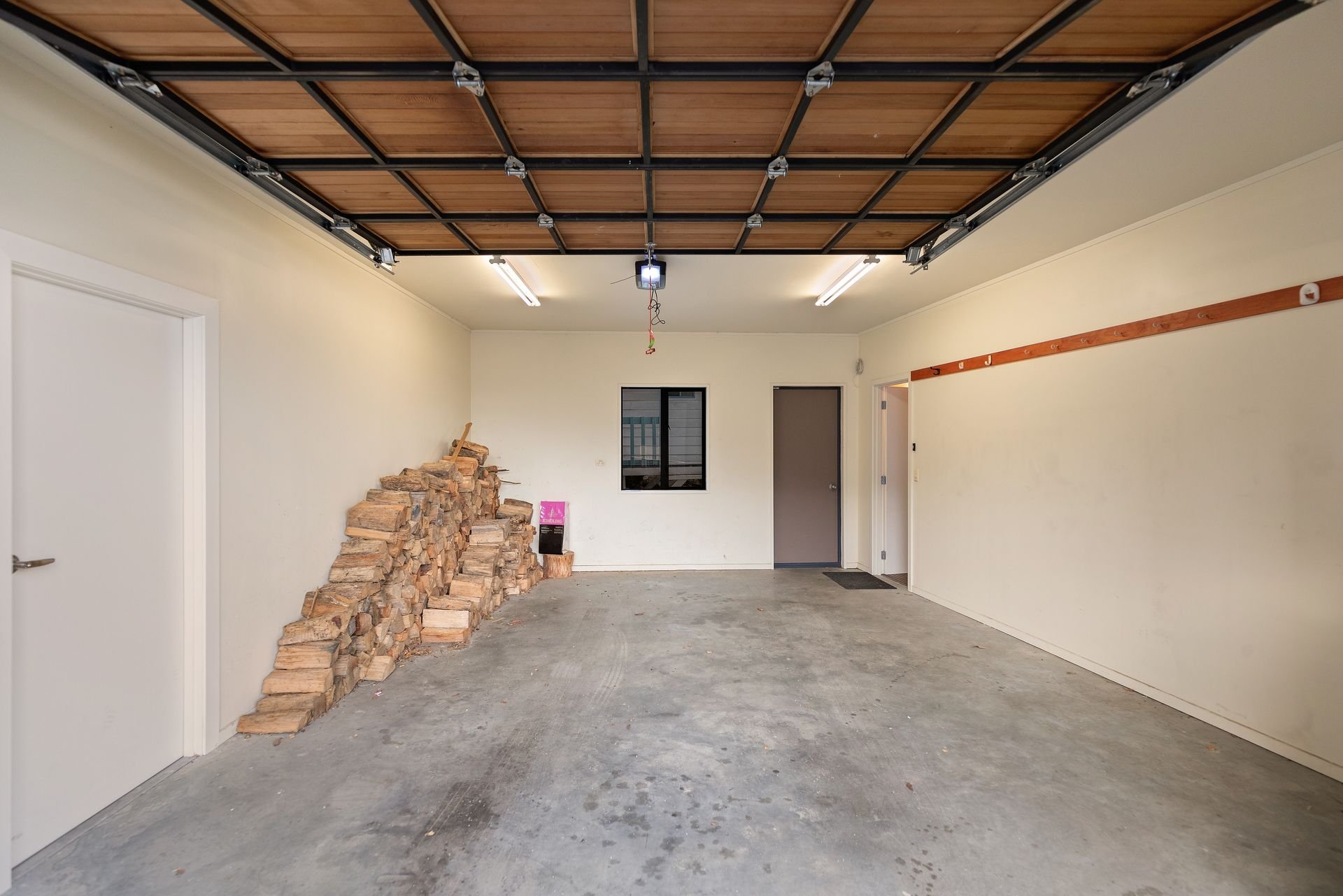 Inside the garage, with space for bike storage at Edinburgh Heights, Queenstown