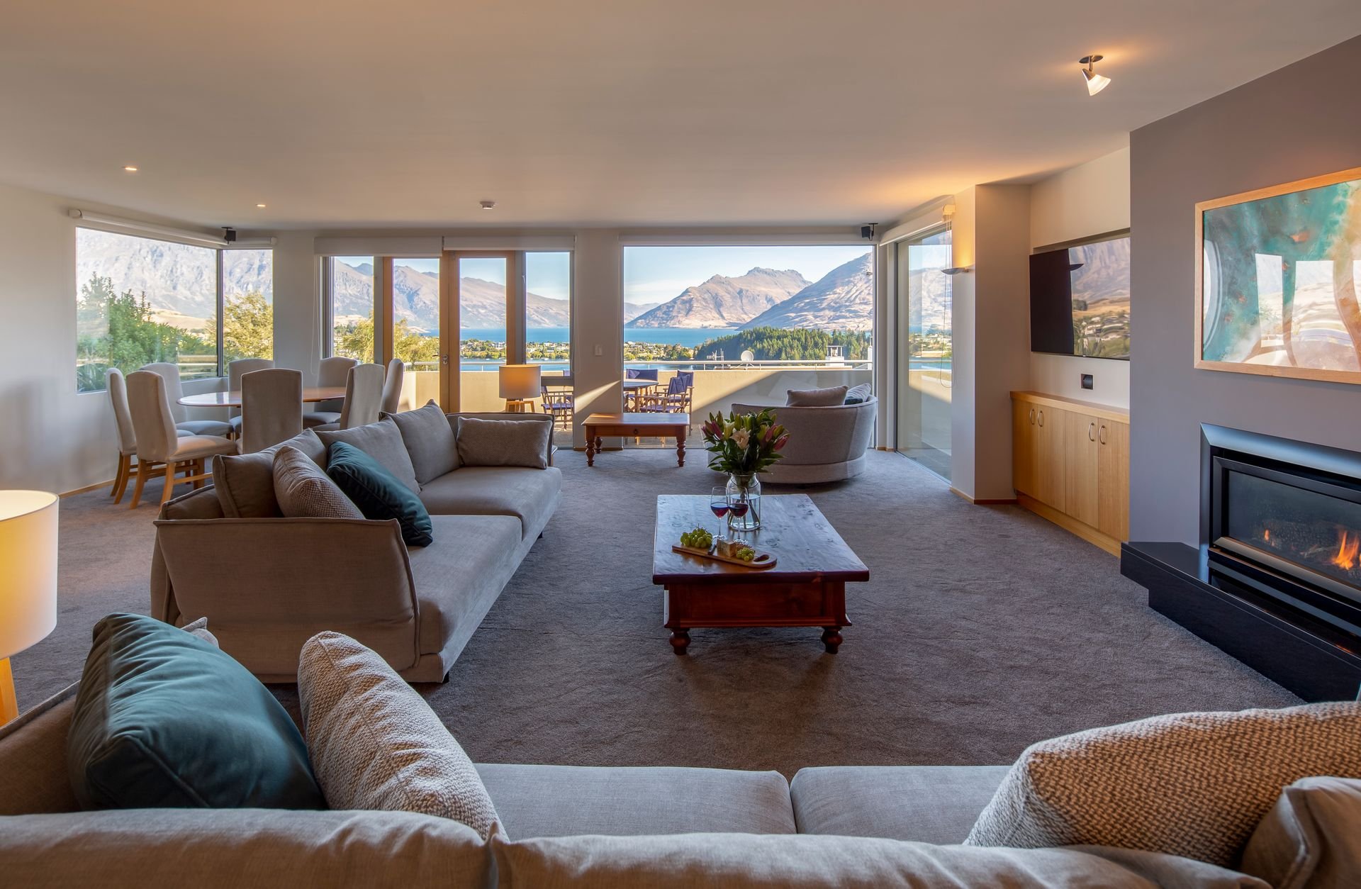 Open-plan living area with lake views at Baraka Lake Views, Queenstown