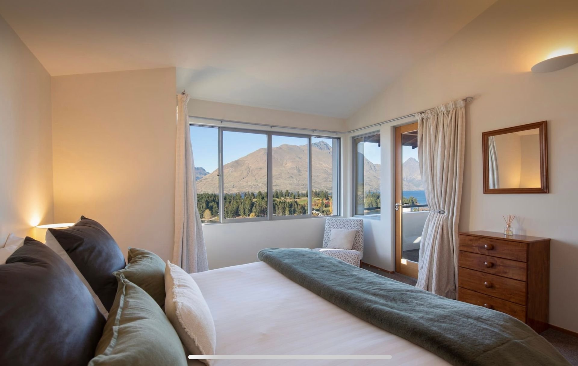 Bedroom with lake views at Baraka Lake Views, Queenstown