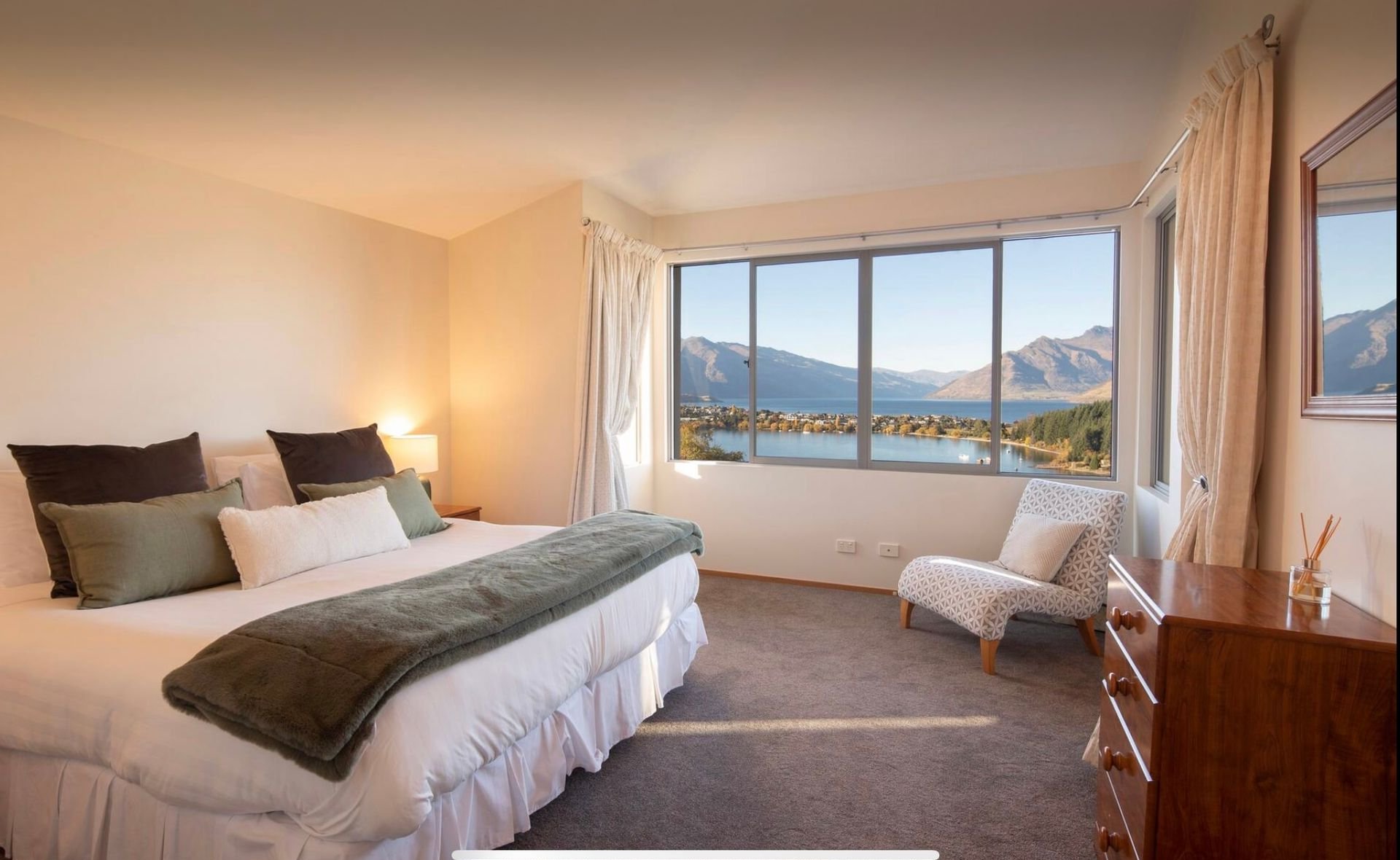 King bedroom with lake views at Baraka Lake Views, Queenstown