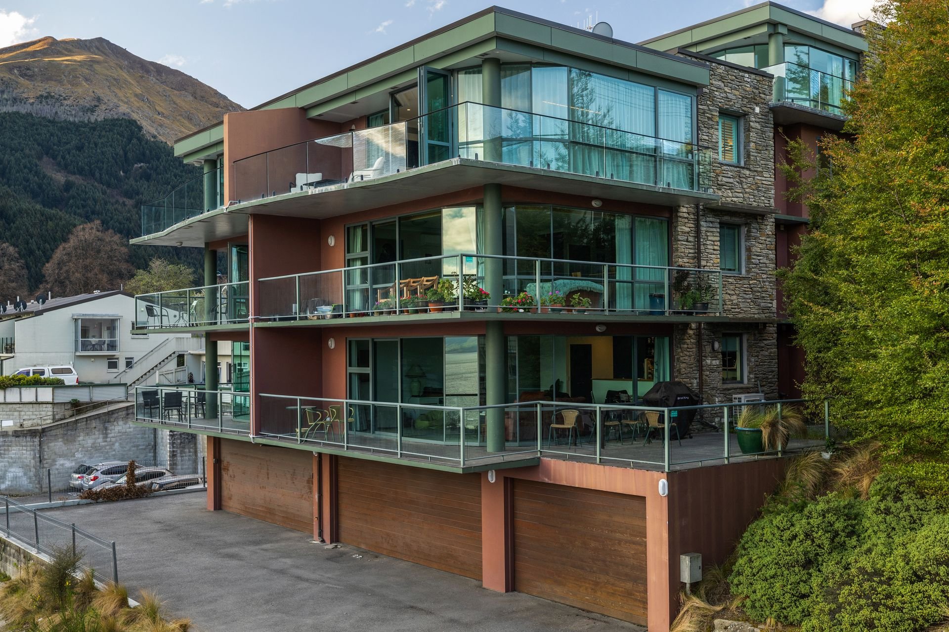 Exterior of the apartment building with garages at Sunset Views, Queenstown