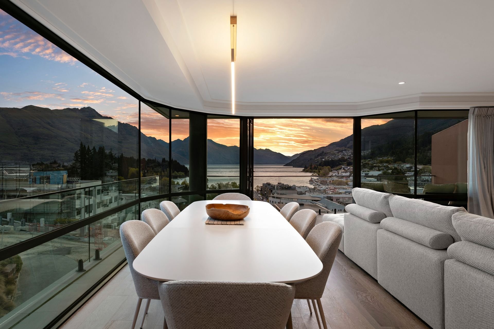 Dining table with sunset view over the lake at Sunset Views, Queenstown