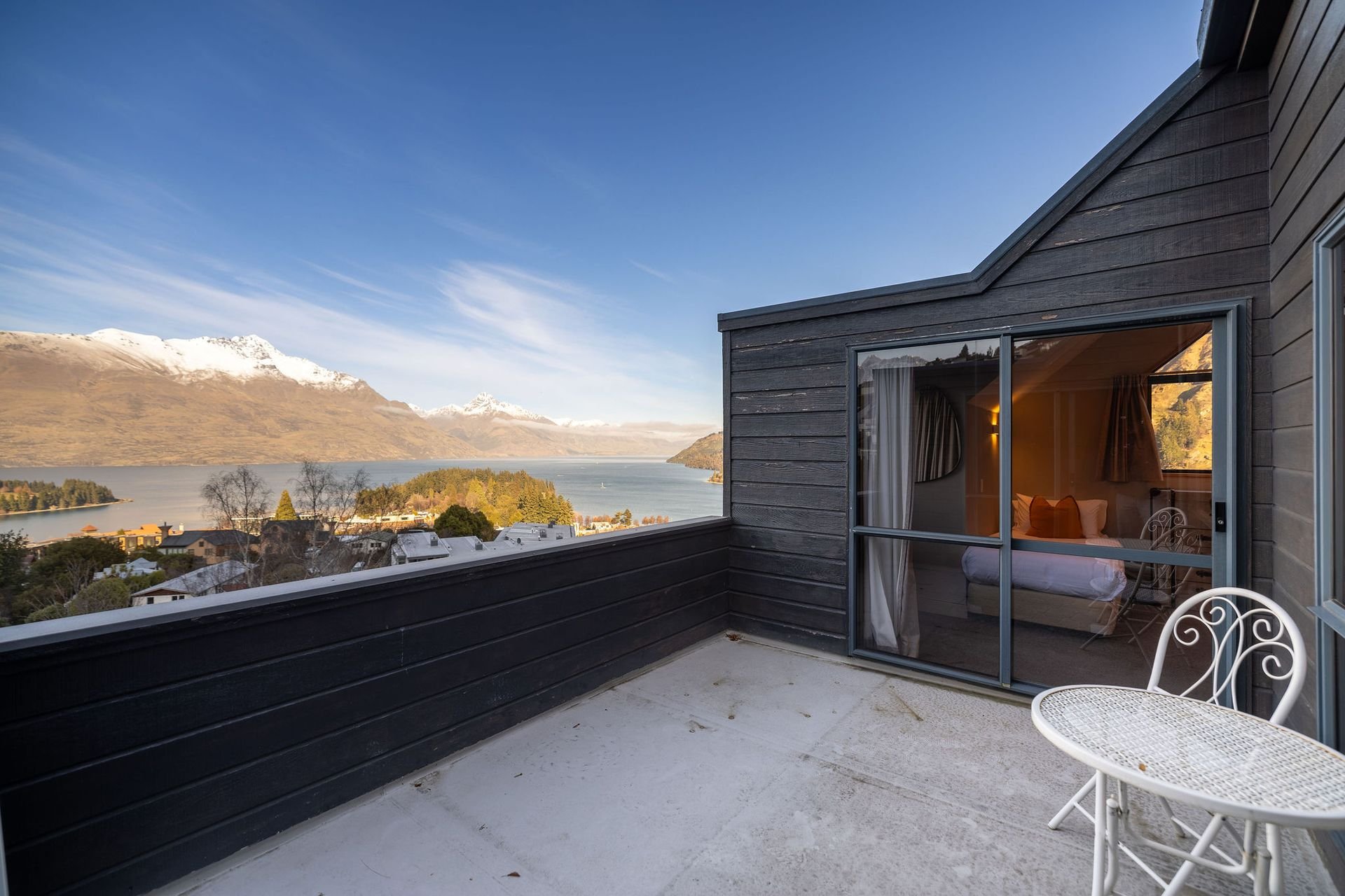 Balcony with lake and mountain views at Alpine Haven, Queenstown