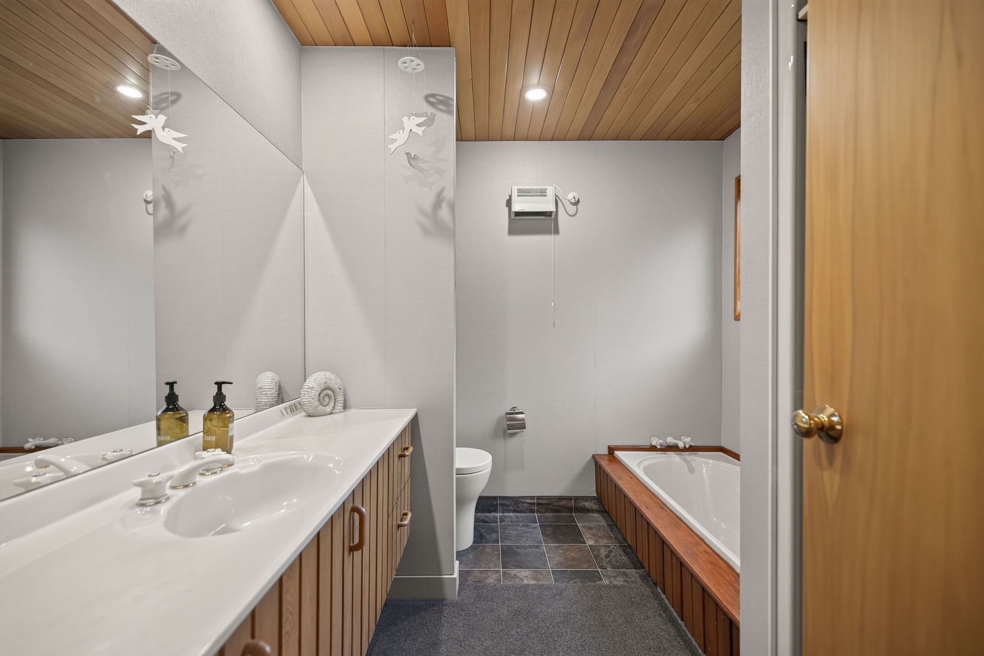 Bathroom with bath at Alpine Haven, Queenstown