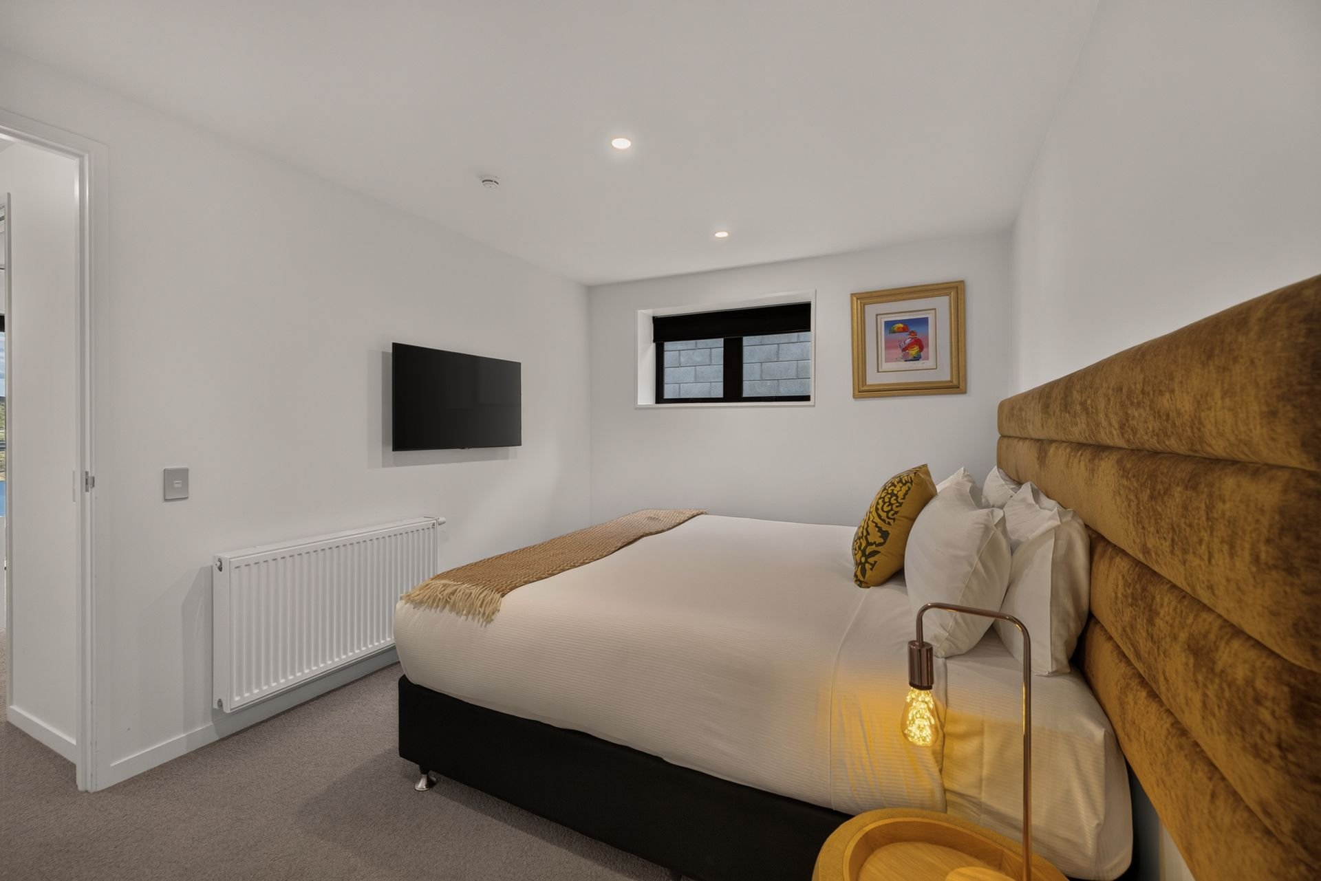 Bedroom with TV at Woods Villa Kea, Queenstown