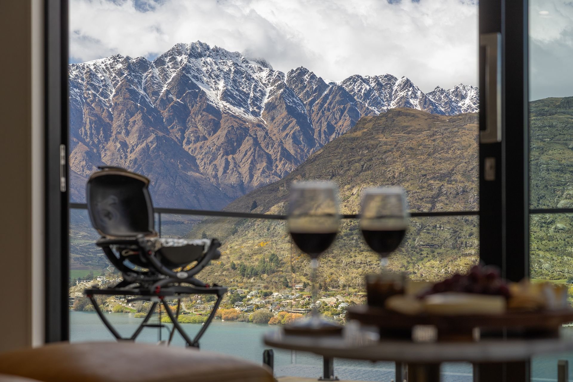 Balcony seat looking over the lake to the mountains at Woods Villa Kea, Queenstown