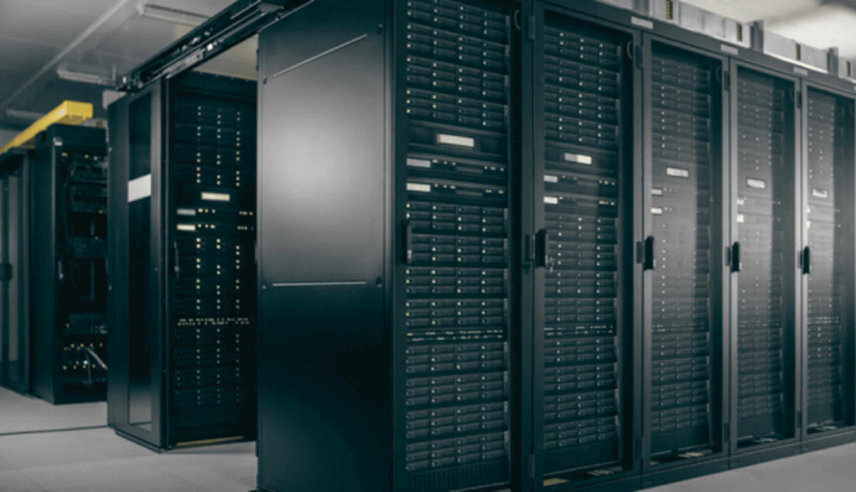 Rows of server cabinets in a data centre