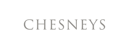 Chesneys brand logo in gray serif lettering on white background.