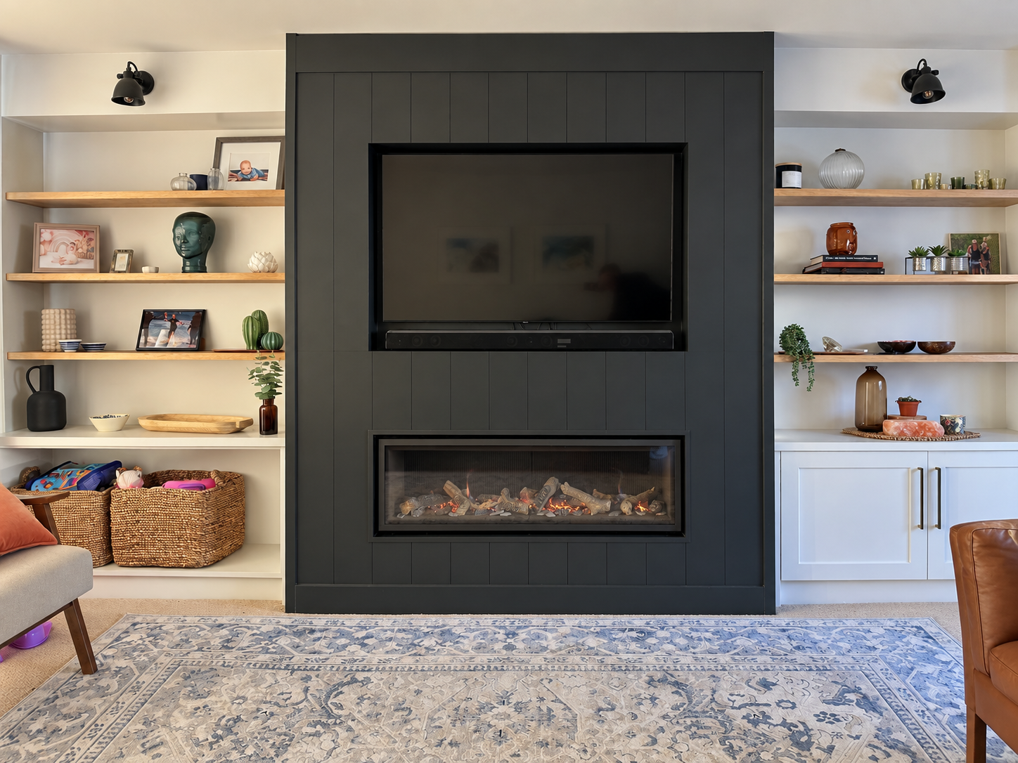 Customer media wall with an electric fire and fitted shelving