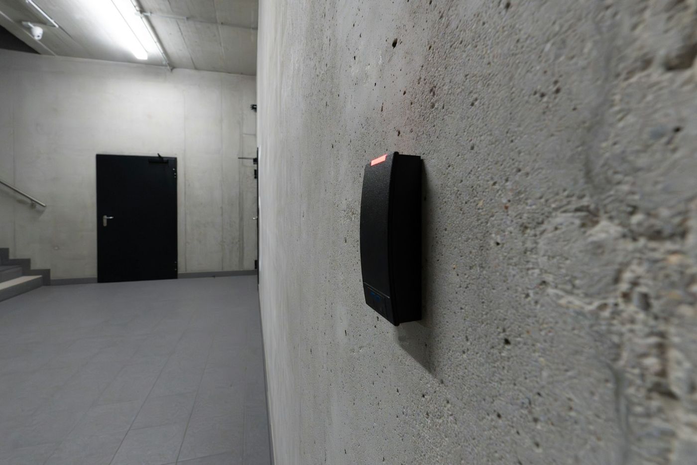 Card reader mounted beside a commercial corridor door