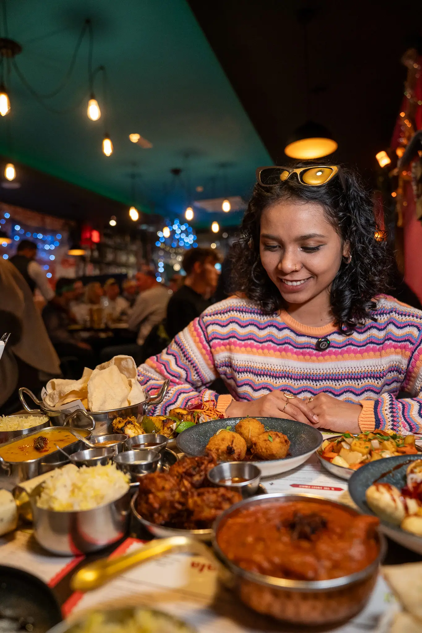 Someone enjoying a festive feast at My Delhi