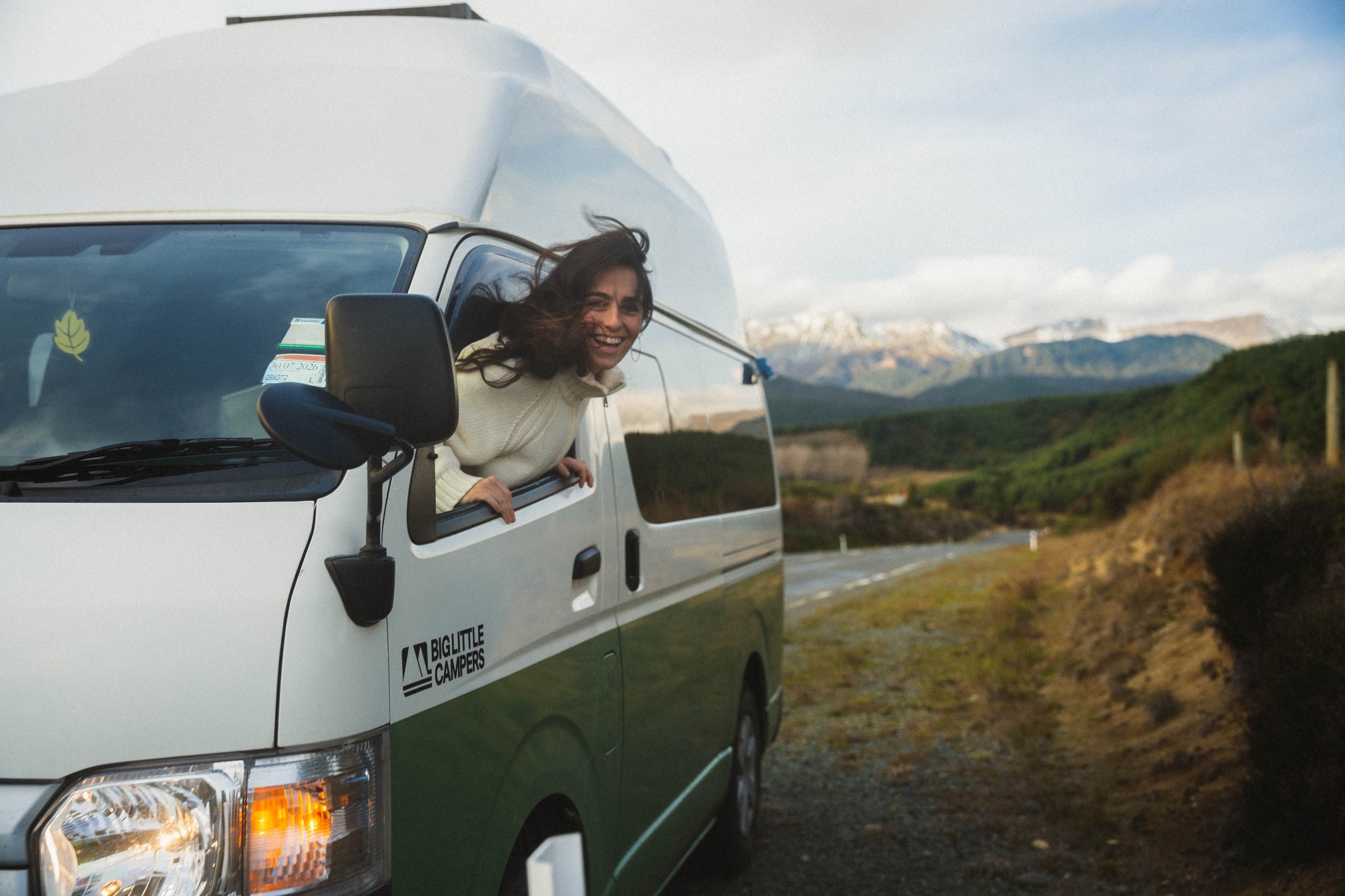 Campervan hire New Zealand South Island, parked on the road under the Southern Alps